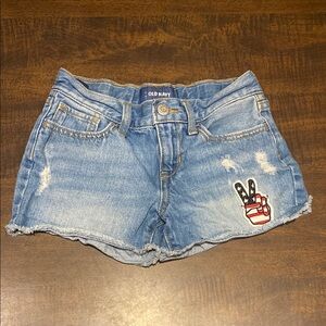 American flag peace sign patch denim distressed shorts